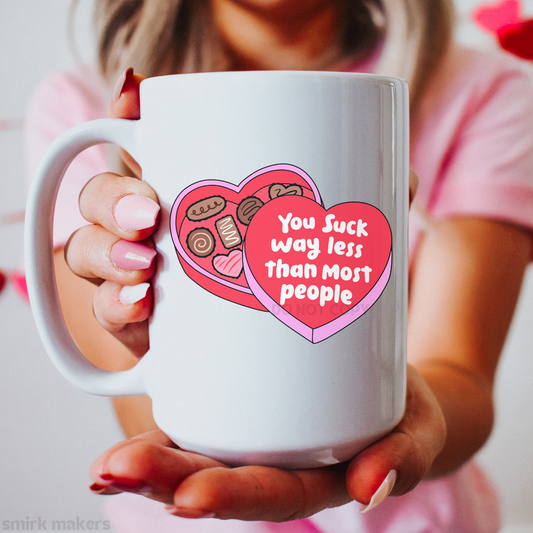 "You suck way less than most people" funny Valentine's mug.